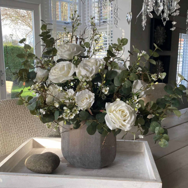 Eucalyptus and Roses in a Taupe frosted Vase