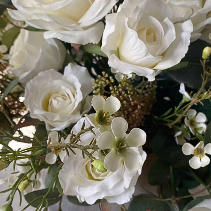 Eucalyptus and Roses in a Taupe frosted Vase