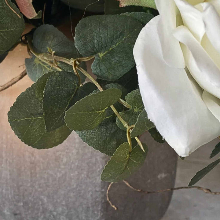 Eucalyptus and Roses in a Taupe frosted Vase