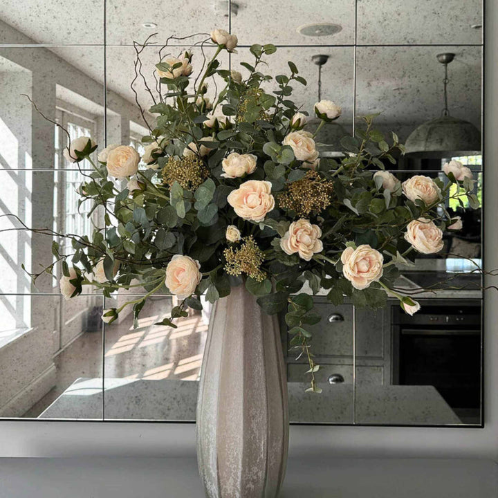 Pink Ranunculus and Eucalyptus in a Frosted Vase