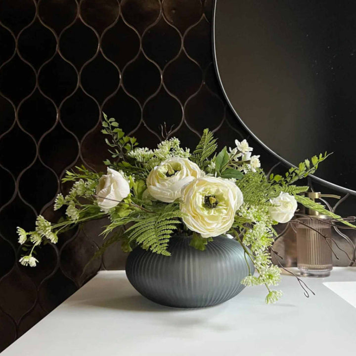 Ranunculus and Fern in a Blue Glass Bowl